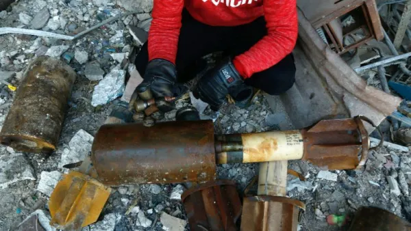 OPCW inspectors collecting samples in Douma, the scene of the chemical attack. (AFP/ File Photo)
