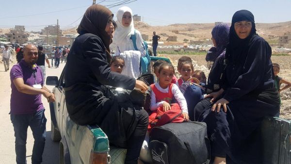 Syrian refugees arrive in Wadi Hamayyed, on the outskirts of Lebanon's northeastern border town of Arsal. (AFP/ File)