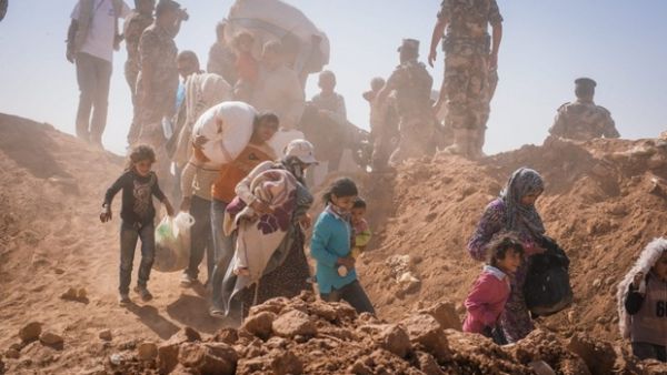 Syrian refugees at the Jordanian border in 2014. (AFP/File)