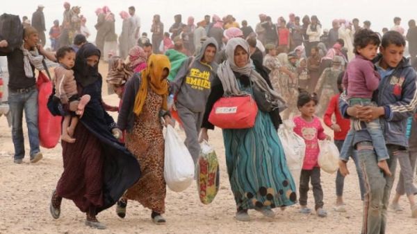 Syrian refugees stranded at the Hadalat border crossing, closed by Jordan after a recent attack on border guards. (AFP/File)