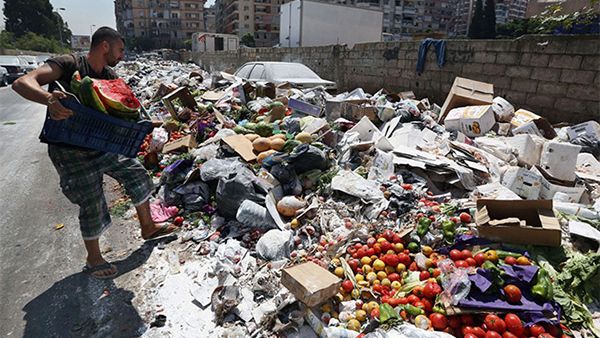 An estimated 300,000 tons of trash have been festering in Lebanon's streets since July. (AFP/File)