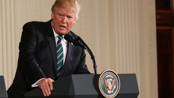 Shortly after the announcement, Trump tweeted what looks like a movie poster image of himself walking that takes creative inspiration from the TV series “Game of Thrones” to announce the reimposition of sanctions. (Shutterstock)