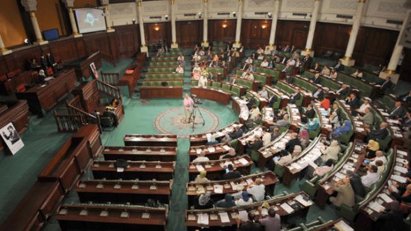 Tunisian MPs attend the first plenary session since the launch of all-party crisis talks on October 29, 2013 in Tunis. (Image credit: AFP).