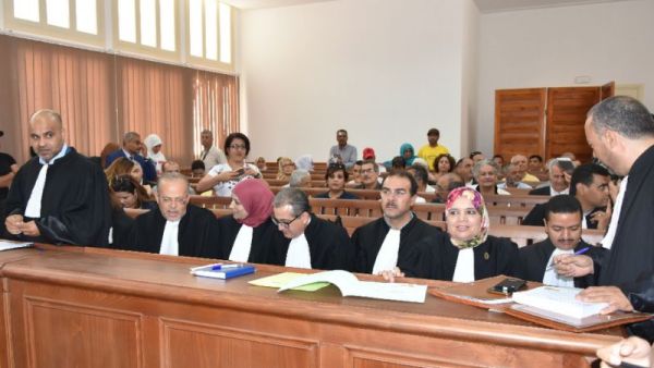 Lawyers in charge of the Kamal Matmati case, a member of the Islamist movement Ennahdha who was arrested in 1991 during Ben Ali's rule and tortured to death, gather in the Gabes court on May 29, 2018. (AFP/ STRINGER)