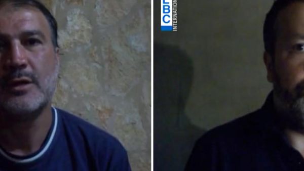 Turkish Airlines pilots Murat Akpinar (L) and Murat Agca, who were kidnapped in Beirut in August 2013. [AFP]