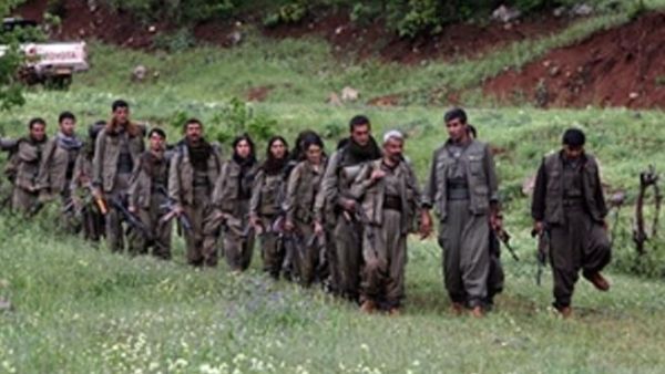 Kurdistan Workers' Party (PKK) fighters arrive in the northern Iraqi city of Dohuk on May 14, 2013, after leaving Turkey as part of a peace drive with Ankara. (AFIN HAMED/AFP/Getty Images)