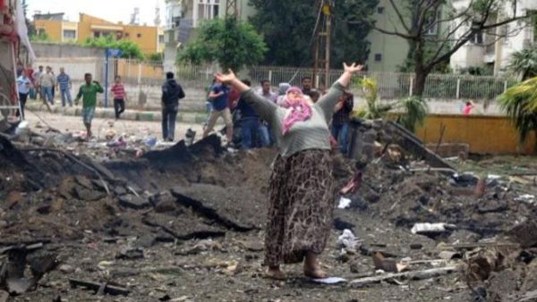 Turkish women in distress at the site of bomb explosion on the Syria border
