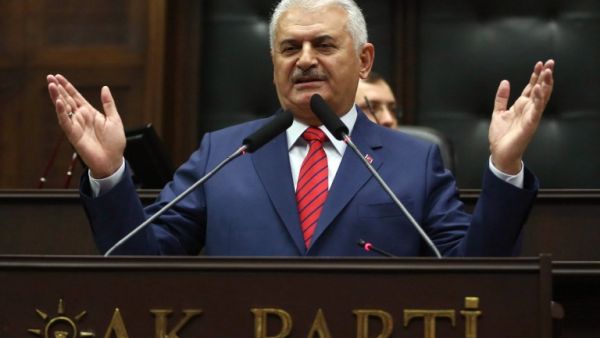 Turkish Prime Minister and the leader of Turkey's ruling party, the Justice and Development Party (AK Party) Binali Yildirim delivers a speech during a meeting of the AK Party at the Grand National Assembly of Turkey in Ankara, on June 28, 2016. (AFP/Adem Altan)