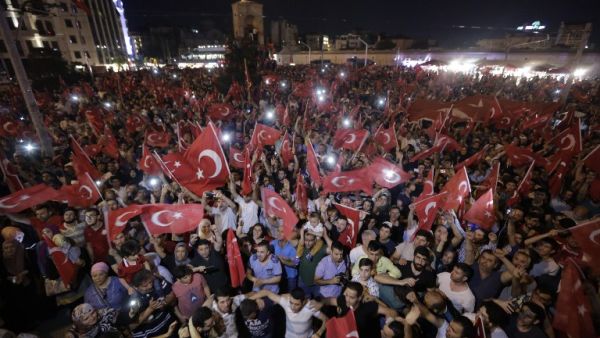 Women gather in Taksim square in Istanbul on July 16, 2016 during a demonstration in support to Turkish President Recep Tayyip Erdogan after a coup that claimed more than 250 lives. (AFP/Yasin Akgul)