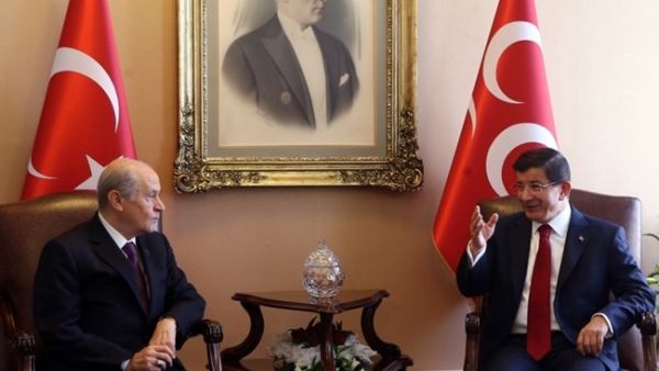 Prime Minister Ahmet Davutoglu, right, and Nationalist Movement Party, MHP, leader Devlet Bahceli during a meeting in Ankara, July 14, 2015. (AFP/Adem Altan)