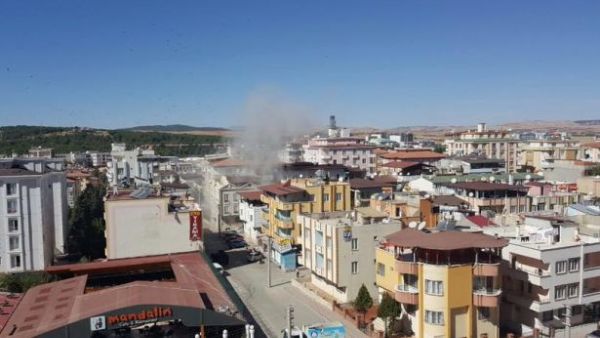 Smoke rises from a building believed to be a Daesh safehouse in Gaziantep, Turkey. (Twitter)