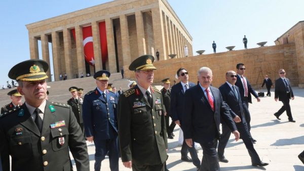 Turkey's Prime Minister Binali Yildirim (3-L) and Chief of the General Staff of the Turkish Armed Forces, Hulusi Akar (2-L) are seen during Turkish Supreme Military Council (YAS) members' visit at Anitkabir, mausoleum of Mustafa Kemal Ataturk in Ankara, on July 28, 2016. (AFP/Adem Altan)