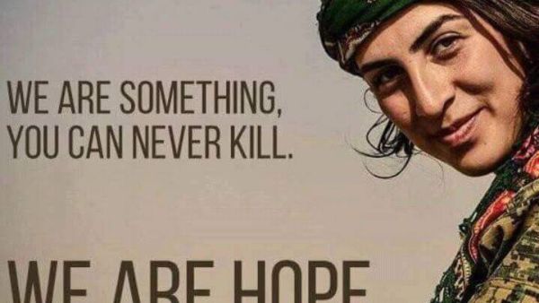 A female fighter in a pro-Kurdish image. [Twitter]