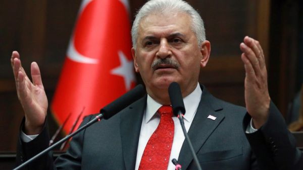Turkish Prime Minister and the leader of Turkey's ruling party, Justice and Development Party (AK Party) Binali Yildirim gives a speech during the AK Party's group meeting at the Grand National Assembly of Turkey (TBMM) in Ankara, on February 7, 2017. (AFP/Adem Altan)