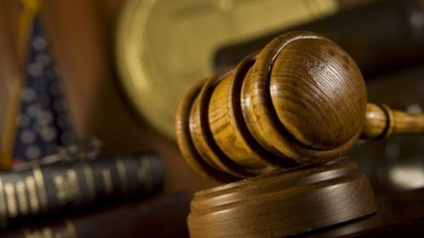 A manager won his appeal as a court cleared him of hugging a female employee and groping her when she arrived at his office to get her labour contract translated. (AFP/ File Photo)