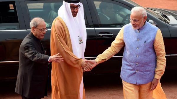 The Crown Prince of Abu Dhabi General Sheikh Mohammed Bin Zayed Al Nahyan (C) is met by Indian Prime Minister Narendra Modi (R) and Indian President Pranab Mukherjee (L) in New Delhi January 25, 2017. (AFP/Money Sharma) The Crown Prince of Abu Dhabi General Sheikh Mohammed Bin Zayed Al Nahyan (C) is met by Indian Prime Minister Narendra Modi (R) and Indian President Pranab Mukherjee (L) in New Delhi January 25, 2017. (AFP/Money Sharma)