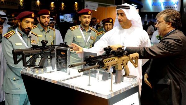 Military representatives of Dubai inspect the goods at the 2013 DSEi international arms fair. (Twitter)