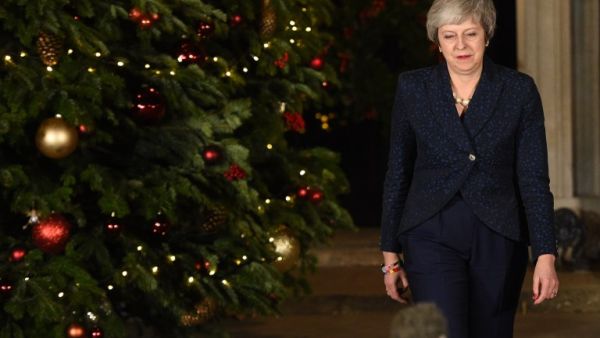 Britain's Prime Minister Theresa May makes a statement outside 10 Downing Street in central London after winning a confidence vote on December 12, 2018. (Oli SCARFF / AFP)