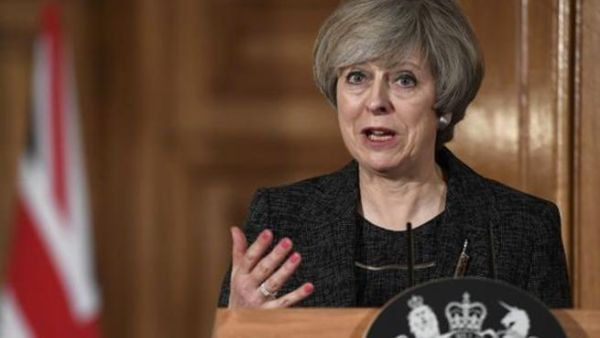 British Prime Minister, Theresa May, is currently facing hard time as Tory MPs vow their would be a 'collapse' of government if she brakes her promises. (AFP/File Photo)