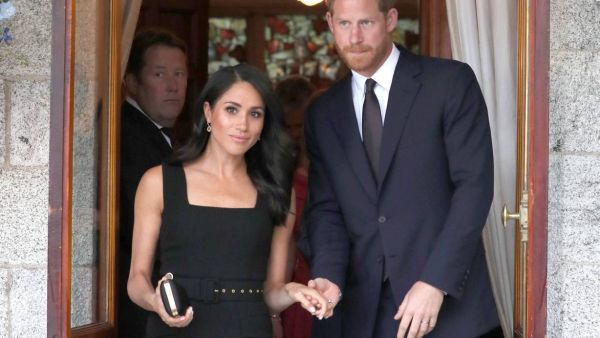 Harry and Meghan attend a summer party at the British Ambassador's residence at Glencairn House
(AFP/File)