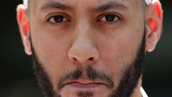 Mohammed Mahmoud, an Imam at Finsbury Park Mosque, gives a statement to the media at a police cordon in the Finsbury Park area of north London on June 19, 2017, following a vehicle attack on pedestrians. (Isabel Infantes/AFP)