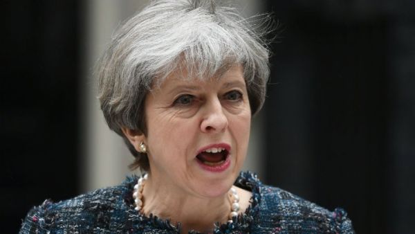British PM Prime Minister Theresa May makes a controversial statement outside 10 Downing Street on May 3, 2017. (AFP/Justin Tallis)