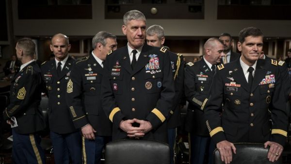 Army General David Rodriguez (C), commander of the US Africa Command, and Army General Joseph Votel (R), commander of the US Special Operations Command, wait for a hearing of the Senate Armed Services Committee on March 8, 2016 in Washington, DC. (AFP/Brendan Smialowski)