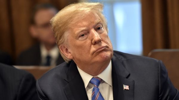 US President Donald Trump listens during a cabinet meeting on July 18, 2018, at the White House in Washington, DC. (Nicholas Kamm / AFP)
