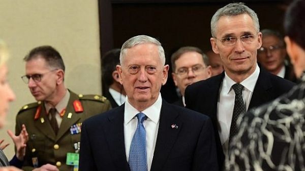 US Defence Minister James Mattis (C) and NATO Secretary General Jens Stoltenberg arrive to attend a NATO defense ministers meetings at NATO headquarters in Brussels, Belgium. (AFP/ File)