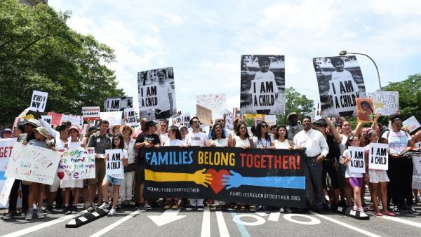 Actor Lin-Manuel Miranda and volunteers march during Families Belong Together Rally In Washington DC Sponsored By MoveOn, National Domestic Workers Alliance, And Hundreds Of Allies on June 30, 2018 in Washington, DC. (AFP/ File Photo)