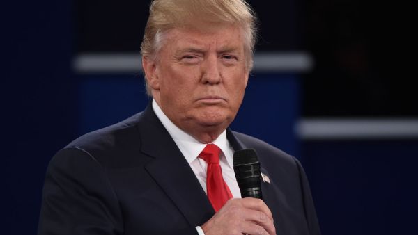 British Parliamentarians are calling for the banning of President Trump from Visiting the UK in July. (AFP/ File)