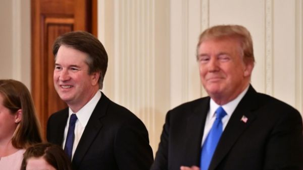 Supreme Court nominee Brett Kavanaugh with US President Donald Trump (MANDEL NGAN/AFP)