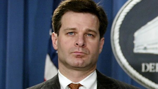 This file photo taken on August 20, 2004 shows US Attorney General for the Criminal Division, Christopher Wray, during a press conference at the Justice Department in Washington, DC. (AFP/File)
