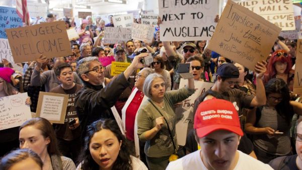 Protesters gather at the Los Angeles International airport to demonstrate against President Trump's executive order effectively banning citizens from seven Muslim majority countries. (AFP/Konrad Fiedler)