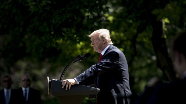 US President Donald Trump announces his decision to withdraw the US from the Paris Climate Accords in the Rose Garden of the White House in Washington, DC, on June 1, 2017. (AFP/Brendan Smialowski)