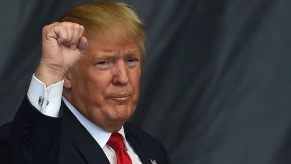 U.S. President Trump has reiterated his promise to decrease "unnecessary and harmful regulations" in an Earth Day message. (AFP/ File Photo)