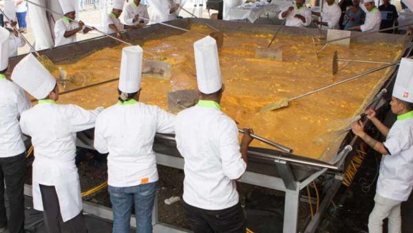A nearly 5,500-pound batch of scrambled eggs cooked up by a team of chefs in Mauritius was certified as the world's largest. (Guinness World Records)