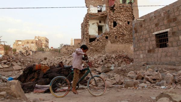 Buildings hit by Saudi air strikes in old neighbourhood of Sanaa in March (AFP)