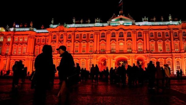 The State Hermitage Museum is seen illuminated in red for the centenary of the Bolshevik revolution in Saint Petersburg on October 25, 2017. (AFP/ File)
