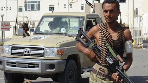 A Saudi-sponsored militiaman loyal to former Yemeni president Abd Rabbuh Mansur Hadi is pictured in front of the May 22 Hospital on the eastern outskirts of port city of Hudaydah, Yemen, on November 15, 2018. (Photo by AFP)