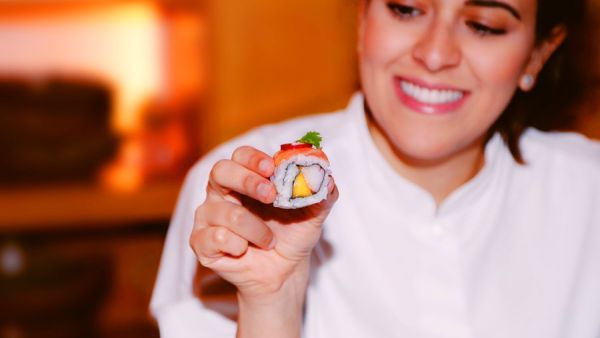 Khulood Olaqi is hands on at the restaurant she owns, manages and even works preparing food in the kitchen. (AN photos by Basheer Saleh)