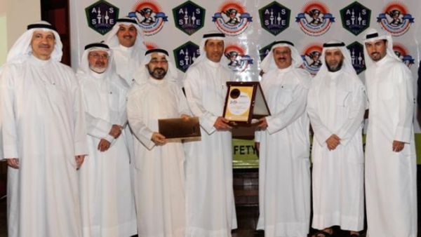 Company executives holding the award