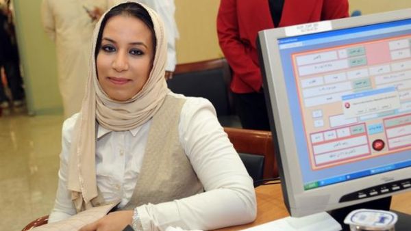 Kuwaiti candidate Haya al-Mutairi registers in the last day for the upcoming parliamentary election in Kuwait City on July 6 (AFP)