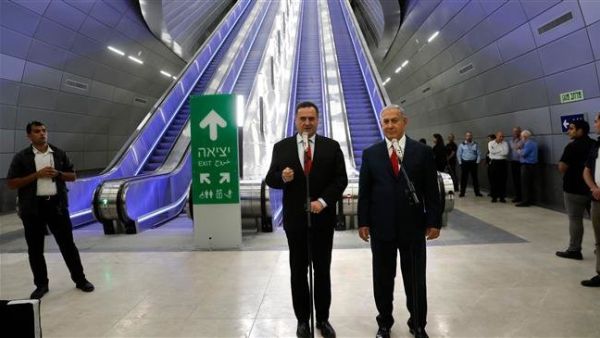 Israeli PM Benjamin Netanyahu (R) stands next to Israel's transportation and intelligence minister Yisrael Katz. (AFP/File)