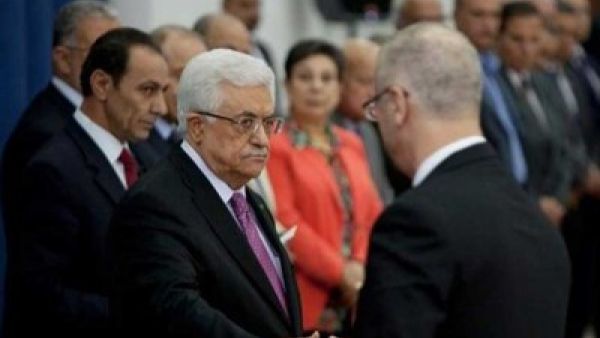 الرئيس الفلسطيني محمود عباس ورئيس الوزراء رامي الحمد الله
