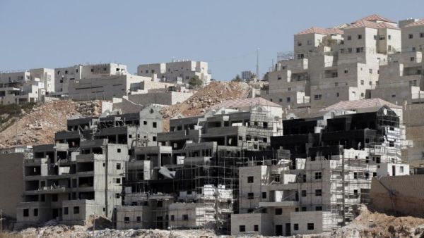 Earlier this week, Israeli Defense Minister Avigdor Lieberman vowed to approve the construction of some 2,500 new settlement units across the occupied West Bank. (AFP/File)