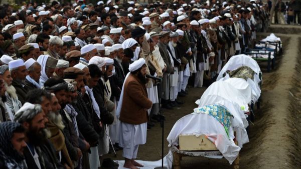 A funeral for a dozen Afghan migrants who had drowned in the Aegean Sea. (AFP/Wakil Kohsar)
