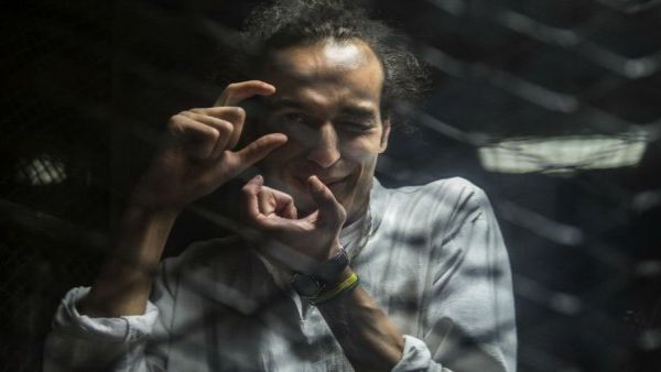 Photojournalist Mahmoud Abou Zeid, known as “Shawkan” is given the 2018 Press Freedom Prize who has been languishing in prison for more than four years and now faces the death penalty in Egypt.  (AFP/File Photo)	
