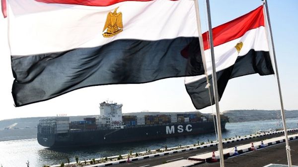 Egypt said it will launch a petrochemical complex, an oil refinery, an industrial complex for solar cells and another for wind turbines, as well as factories for textiles, foodstuffs, electrical appliances and motorcycles. (AFP/ Mohamed El-Shahed)