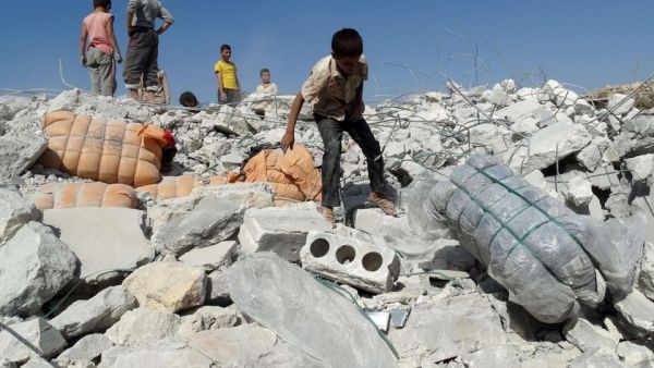 Damage from a U.S.-led airstrike in a northwestern Syrian village, September 2014.  (AFP/Sami Ali)